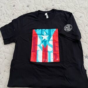 Hamilton’s Lin Manuel Miranda Black Tee with Puerto Rican Flag Design